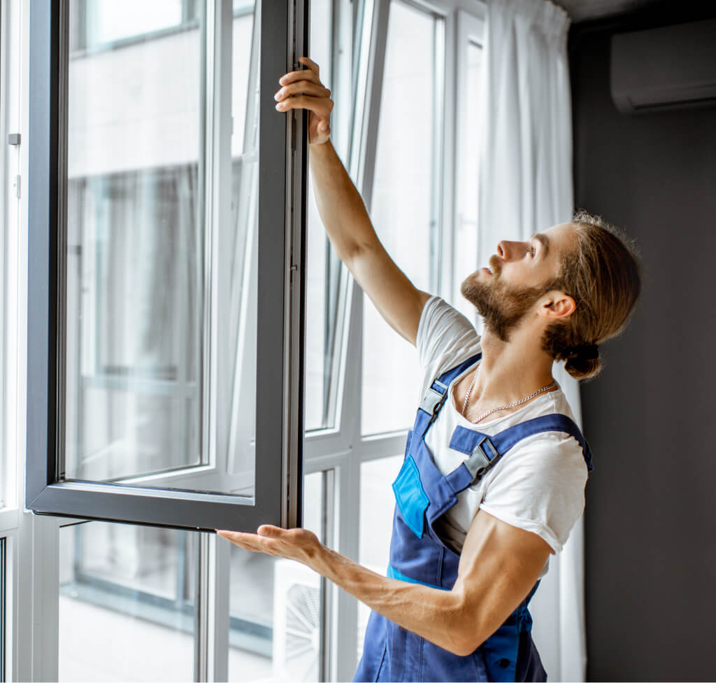 workman adjusting window frames at home 2021 10 13 18 27 58 utc